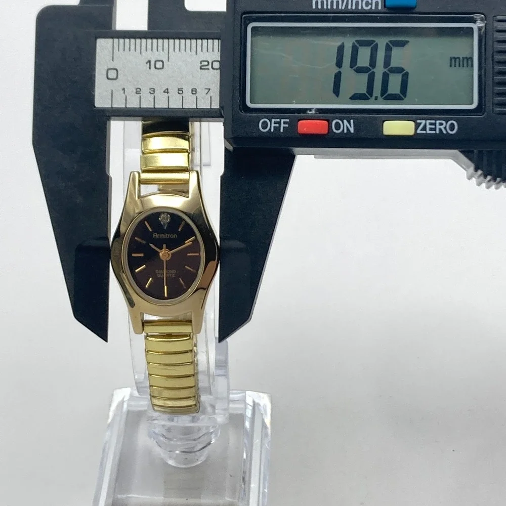 Vintage Armitron Women's Watch Gold Tone Diamond Stretch Band New Battery 6.75